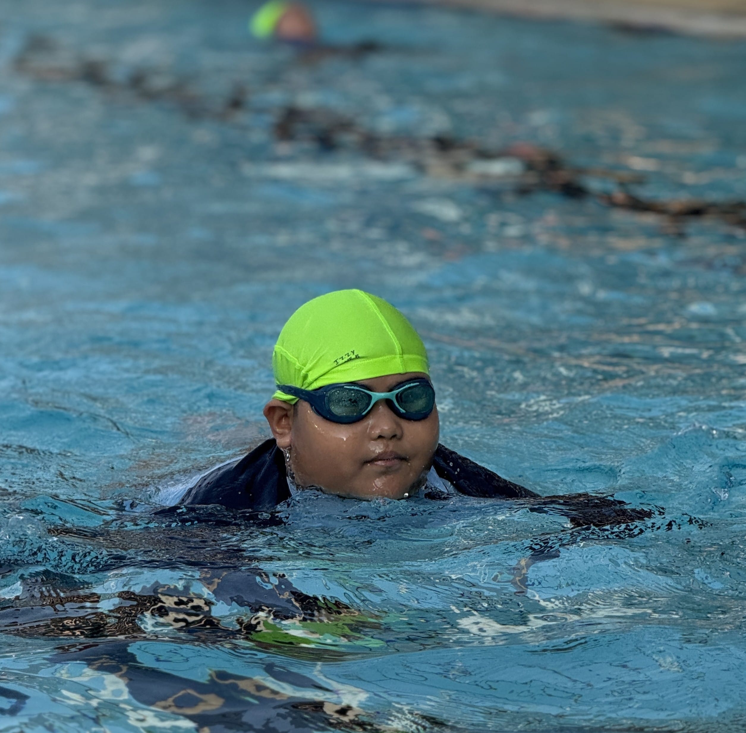 Confidently swimming using breaststroke